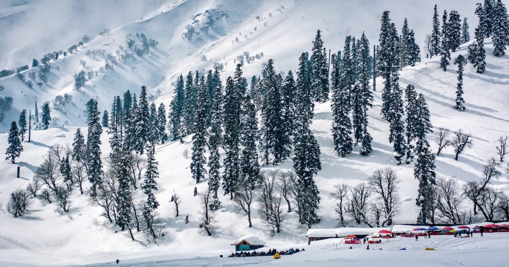 Gulmarg Kashmir covered with lush green meadows and snow-capped mountains, a popular destination for sightseeing, gondola rides, and adventure tourism